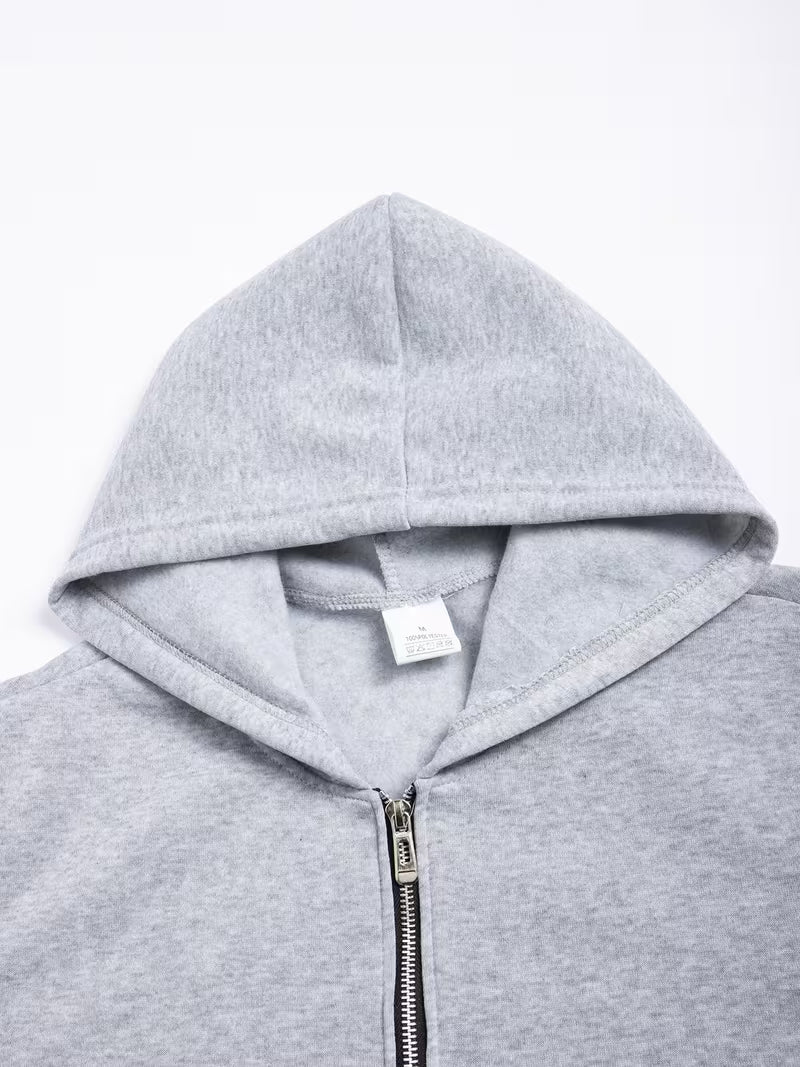 Ensemble deux pièces pour homme comprenant un sweat à capuche zippé à demi-zip avec doublure polaire et un pantalon polaire assorti.